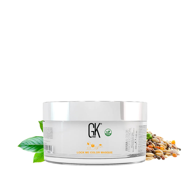 GK Hair Lock Me Color Masque 200 g clear jar with silver lid, vegan badge, UV/UVA & Color Protection, leaves and seeds beside it