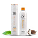 GK Hair Shampoo and Conditioner. Surrounded by leaves and coconut on a white background