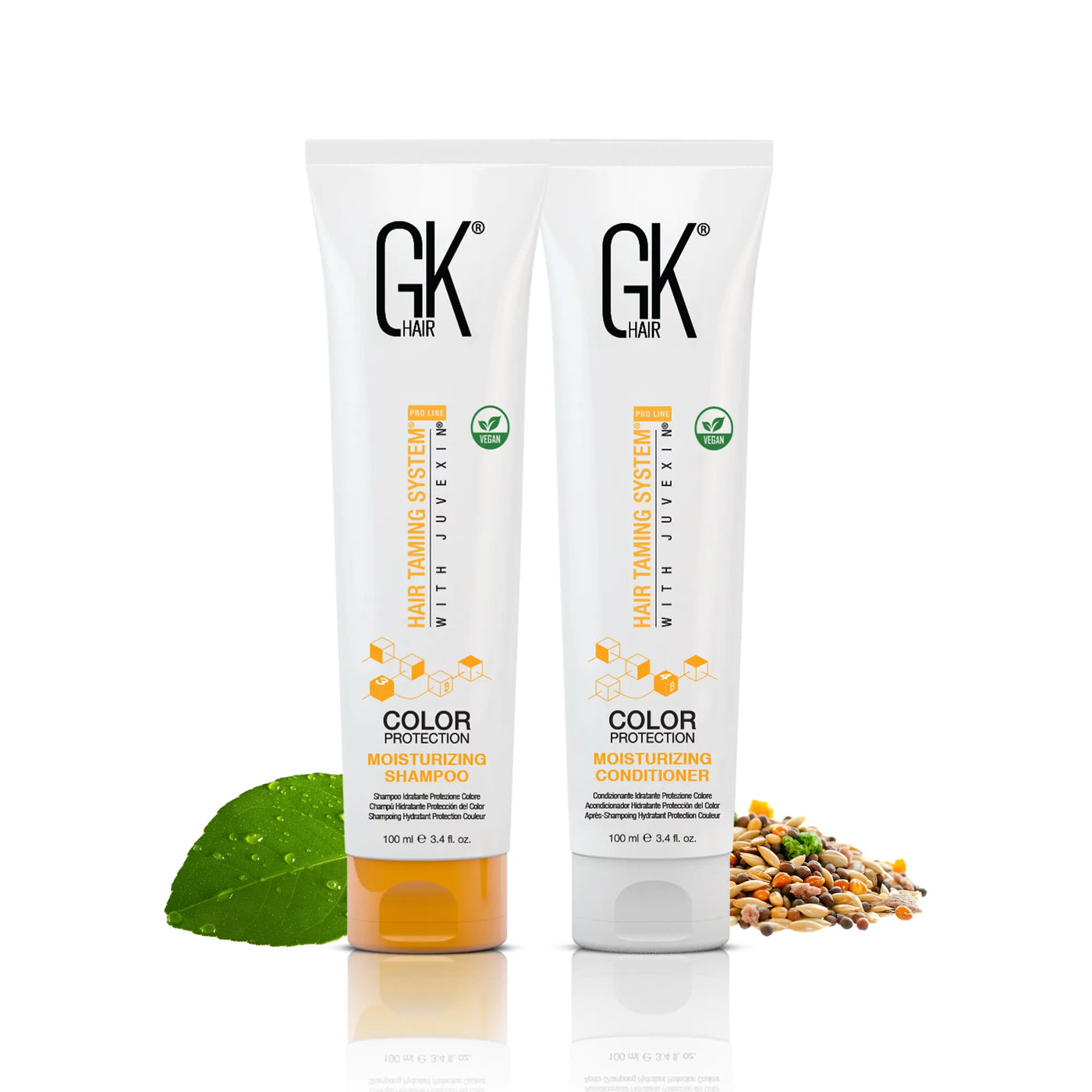 GK Hair Moisturizing Shampoo and Conditioner in a 100 ml tube, surrounded by green leaves and seeds in a white background