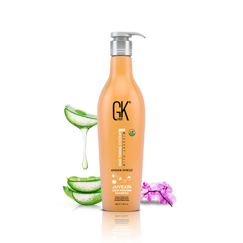 GK Hair Juvexin Color Protection Shampoo 650 ml orange pump bottle with aloe vera slices and a pink orchid