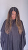 Video showing an influencer step-by-step applying GK Hair The Best Professional Keratin Treatment to hair, featuring application, blow-drying, and flat-ironing.