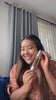 Product film '5 Situations to use GK Hair Serum': woman applies the amber serum, captions list heat protection, shine and frizz control